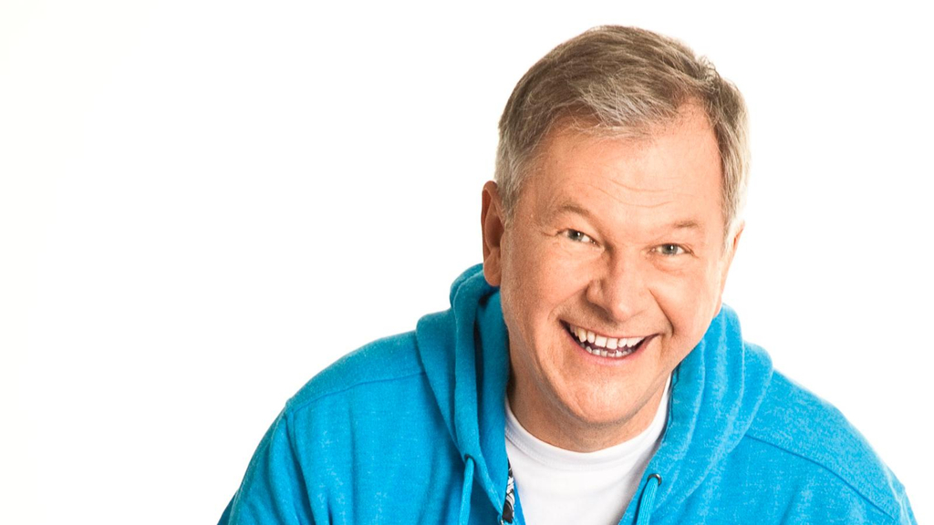 Ein Porträtfoto von dem Kinderliedermacher Reinhard Horn.