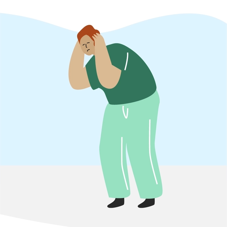 Die Grafik zeigt eine Person in grüner Kleidung. Sie hält sich mit beiden Händen schützend den Kopf und wirkt bedrückt oder überfordert.