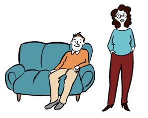 Mann sitzt auf dem Sofa, eine Frau steht daneben