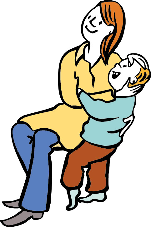 Frau hält ein Kind im Arm