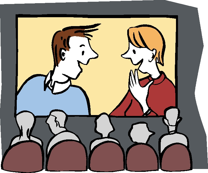 Menschen sitzen im Kino vor einer Leinwand