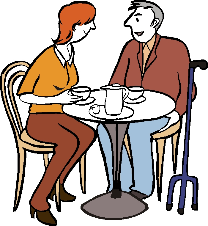 Mann und Frau unterhlten sich bei einer Tasse Kaffee