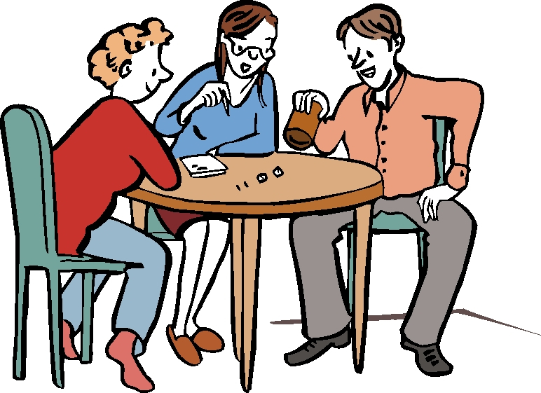 Drei Leute sitzen am Tisch und spielen mit Würfeln