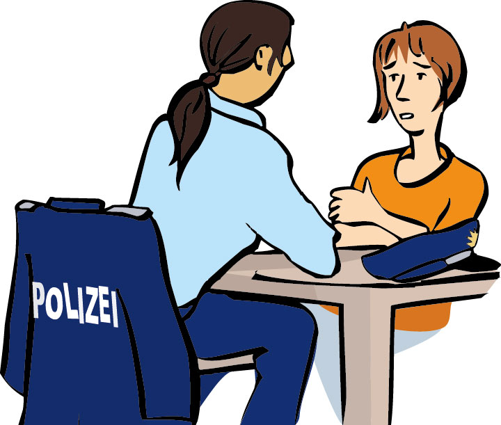 Frau spricht mit einem Polizisten