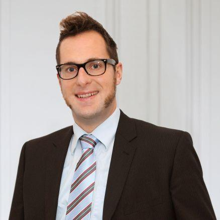 Ein Portraitfoto von Thomas Kruse.