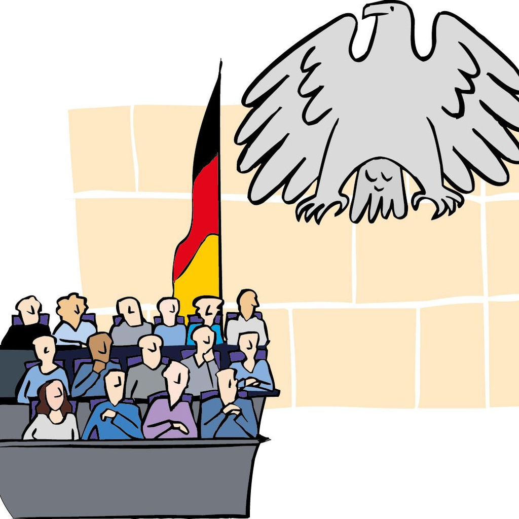 Männer und Frauen sitzen auf den Abgeordnetenbänken im deutschen Bundestag
