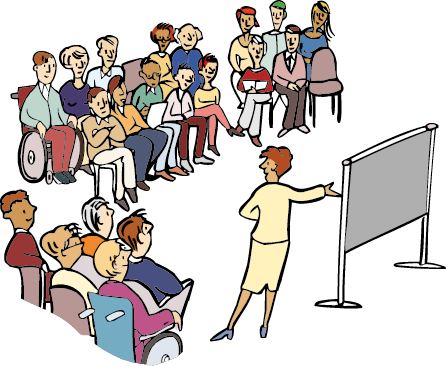 Eine Frau steht vor einer Gruppe und zeigt etwas an einer Tafel.